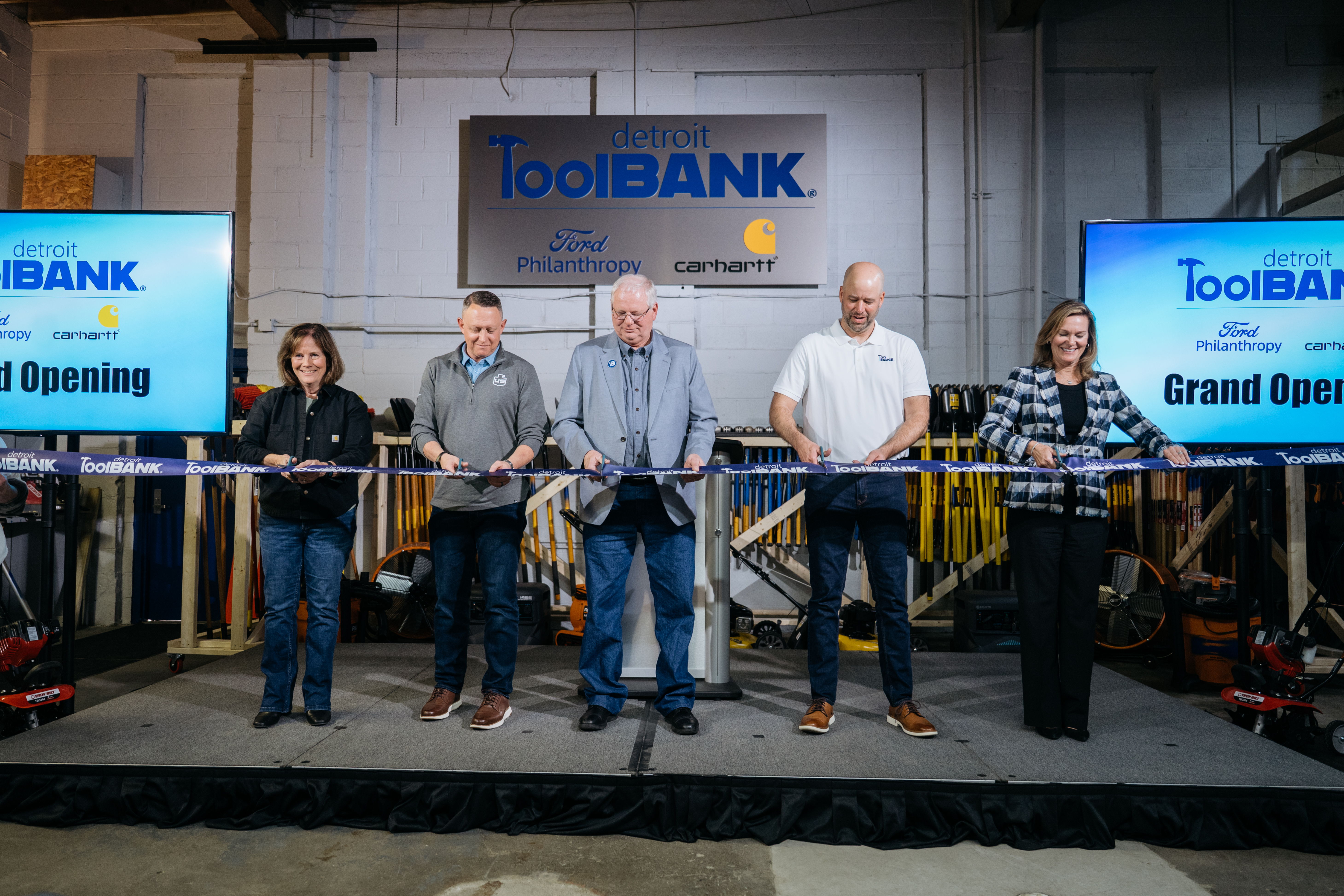 Carhartt President and CEO Linda Hubbard, Detroit ToolBank Board President Aaron Cowell, Detroit ToolBank Executive Director Dave Bartek, ToolBank USA CEO Trey Bearden, and President of Ford Philanthropy Mary Culler